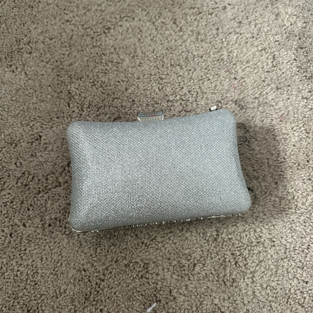silver sparkling clutch